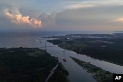 A vessel  passes done  the Agua Clara Locks of the Panama Canal successful  Colon, Panama, Sept. 2, 2024.