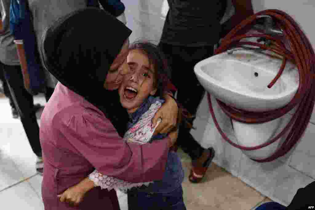 A Palestinian girl reacts at the Nasser hospital on Nov. 3, 2024, amid the ongoing war between Israel and the Palestinian Hamas militant group.