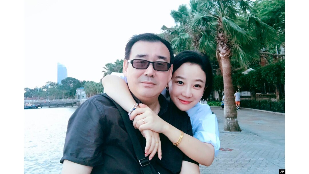 FILE - This undated, file photo released by Chongyi Feng shows Yang Hengjun and his wife Yuan Xiaoliang. Australia says it is appalled at China’s suspended death sentence for Chinese Australian writer and democracy blogger Yang Hengjun.