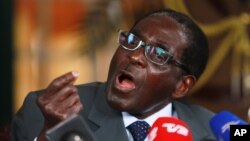 Zimbabwean President Robert Mugabe speaks during a press conference at State House in Harare, July, 30, 2013. 