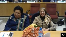 Prof. Dosso Mireille Carmen of Ivory Coast and Prof. Dr. Ebtehal El Demerdash of Egypt at AU headquarters to receive the Kwame Nkrumah Science Prize, December 14, 2011.