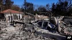 Homes destroyed by the Palisades Fire are seen in the Pacific Palisades neighborhood of Los Angeles, Jan. 16, 2025. 