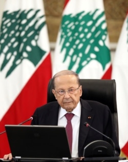 FILE - Lebanon's President Michel Aoun delivers a speech from the presidential palace in Baabda, Lebanon, June 25, 2020.