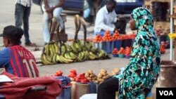 Sellers at Abuja's Utako market say they charge more for products during Ramadan because farmers charge more, Nigeria, July 2013 (Heather Murdock for VOA).