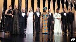 Jury members appear at the opening ceremony of the 71st international film festival, Cannes, southern France, Tuesday, May 8, 2018. (Photo by Vianney Le Caer/Invision/AP)