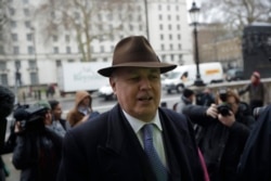 FILE - Former leader of Britain's ruling Conservative Party Iain Duncan Smith arrives for a meeting in London, February 4, 2019.