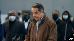 FILE - New York Gov. Andrew Cuomo speaks at a vaccination site in New York, March 8, 2021.