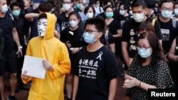 FILE - Hong Kong activist dubbed "Captain America 2.0" Ma Chun-man attends a vigil for a protester Marco Leung Ling-kit who fell to his death during a demonstration outside the Pacific Place mall, June 15, 2020. 