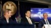 FILE - John Schoettler, Amazon VP for real estate and facilities (L), joins New York Gov. Andrew Cuomo (C), and New York City Mayor Bill de Blasio during a news conference, Nov. 13, 2018, in New York. Amazon said it will split its second HQ between New York and Virginia.
