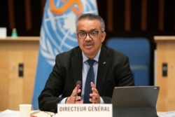 FILE - Tedros Adhanom Ghebreyesus, WHO director-general, speaks during the 148th session of the Executive Board on the coronavirus disease outbreak in Geneva, Switzerland, Jan. 21, 2021.