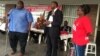 FILE: Progressive Teachers Union of Zimbabwe secretary general Raymond Majongwe (right) addressing members of his union. (Photo: PTUZ)