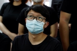 FILE - Pro-democracy activist Sunny Cheung attends a news conference in Hong Kong, July 15, 2020.