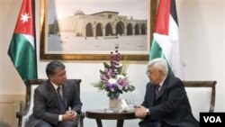 Raja Yordania Abdullah II (kiri) dan Presiden Palestina Mahmoud Abbas (kanan) (21/11).