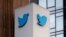 FILE PHOTO: A Twitter logo is seen outside the company headquarters in San Francisco