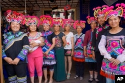 Female entrepreneurs in Chuxiong, Yunnan Province increased their income and helped preserve the Yunnan Embroidery cultural industry thanks to Mary Kay Women’s Entrepreneurship Program, Jan. 30, 2014. (Photo: Mary Kay Inc. via AP)