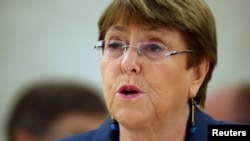 FILE - U.N. High Commissioner for Human Rights Michelle Bachelet attends a session of the Human Rights Council at the United Nations in Geneva, Switzerland, Feb. 27, 2020.