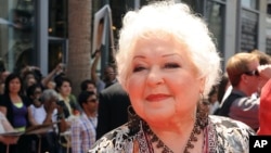 FILE - Estelle Harris arrives at the world premiere of "Toy Story 3," June 13, 2010, at The El Capitan Theater in Los Angeles.