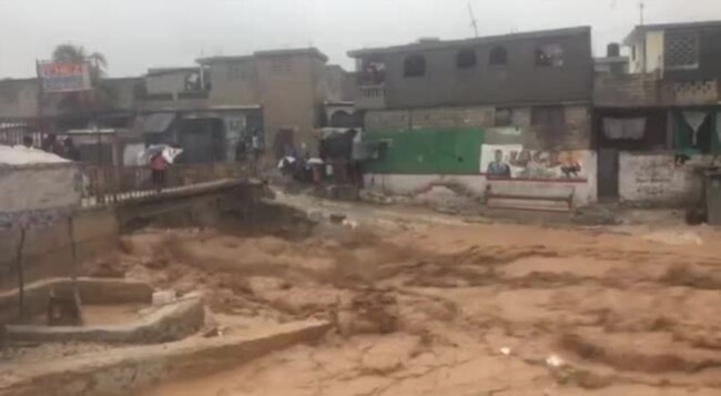 Haiti Tropical Storm Laura - Raging Riviere Froide River Threatens Residents, Homes 