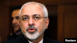 FILE - Iranian Foreign Minister Mohammad Javad Zarif talks with reporters in Geneva, Switzerland. 