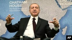 Turkey's President Recep Tayyip Erdogan speaks at Chatham House in London, May 14, 2018. Erdogan started Sunday a three-day visit to Britain by praising the country as "an ally and a strategic partner, but also a real friend." 