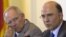 German Finance Minister Wolfgang Schaeuble, left, and his new counterpart from France Pierre Moscovici brief the media after a meeting at the Finance Ministry in Berlin, May 21, 2012.