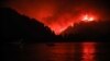 Api kebakaran hutan berkobar di Limni, Pulau Evia, Yunani, 6 Agustus 2021. (Foto: Sotiris Dimitropoulos/Eurokinissi via Reuters