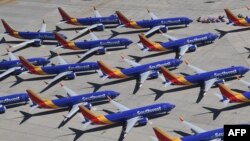 Boeing 737 MAX de Southwest Airlines stationnés sur le tarmac à l'aéroport de logistique sud-californien de Victorville, en Californie, le 28 mars 2019.