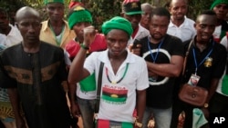 FILE - Members of the Biafran separatist movement gather during an event in Umuahia, Nigeria, on May 28, 2017. Five people were arrested in Finland in connection with violence in the area of Nigeria where the separatists are active, police said on Nov. 21, 2024.