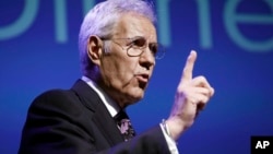 In this Oct. 1, 2018 file photo, moderator Alex Trebek speaks during a gubernatorial debate between Democratic Gov. Tom Wolf and Republican Scott Wagner in Hershey, Pa. 