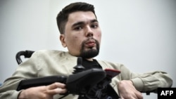 Alexander Gorbunov, also known as blogger StalinGulag, talks to an AFP correspondent during an interview in Moscow, May 3, 2019. The 27-year-old author of StalinGulag skewers "hypocrisy" of Putin's system and the everyday injustices ordinary Russians face.