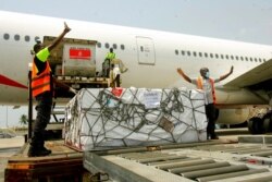 A shipment of COVID-19 vaccines distributed by the COVAX Facility arrives in Abidjan, Ivory Coast, Feb. 25, 2021. Ivory Coast is the second country in the world after Ghana to receive vaccines acquired through the U.N.-backed COVAX initiative.