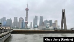 Naiknya permukaan air sungai setelah Topan Bebinca menerjang Shanghai, China, 16 September 2024. (Foto: REUTERS/Xihao Jiang)