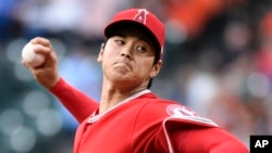 Los Angeles Angels pitcher Shohei Ohtani delivers during the first inning of the team's baseball game against the Houston Astros, Tuesday, April 24, 2018, in Houston. (AP Photo/Eric Christian Smith)