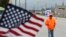 Rocky Perry, a 20-year General Motors employee, pickets outside the GM Fabrication Division, Oct. 16, 2019, in Parma, Ohio. 