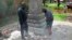 Workers begin removing a Confederate statue in Gainesville, Fla., Aug. 14, 2017. The statue is being returned to the local chapter of the United Daughters of the Confederacy, which erected the bronze statue in 1904.