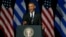 U.S. President Barack Obama laughs as he delivers a speech at the new opera of Athens on Nov. 16, 2016. 