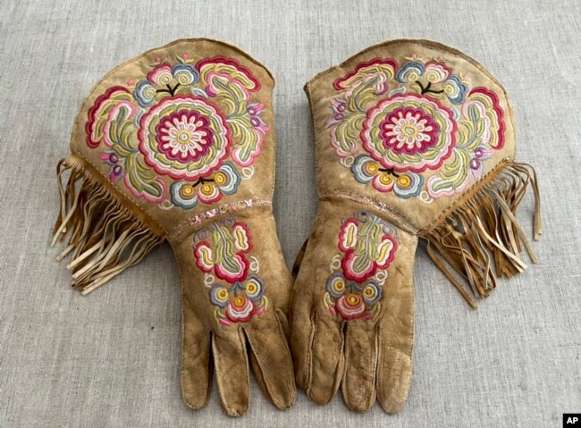 This undated photo provided on Wednesday, July 20, 2022, by Gregory Scofield, shows a pair of gauntlets he made in the late 19th-century Cree-Metif native Canadian traditional style.