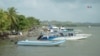 Lanchas en el muelle de Necoclí, utilizadas por los migrantes que buscan llegar hacia la frontera con Panamá, el jueves 6 de febrero de 2025. [Foto: Johan Reyes, VOA]. 