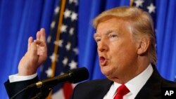 President-elect Donald Trump speaks during a news conference in the lobby of Trump Tower in New York, Jan. 11, 2017. 