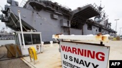 FILE - The USS Bataan is seen docked at the U.S. Naval Base in Norfolk, Virgina, Mar. 23, 2011.