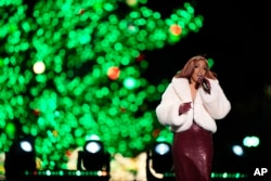 Mickey Guyton performs during the National Christmas Tree lighting ceremony on the Ellipse near the White House in Washington, Dec. 5, 2024.