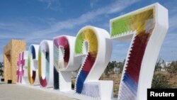 COP27 sign is seen at the Green Zone at the UN climate summit, in Sharm el-Sheikh