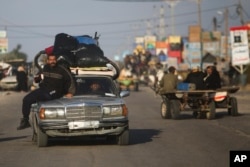 Palestinians flee the Israeli ground offensive in Khan Younis, Gaza, on Dec. 6, 2023.