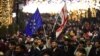 Anti-government demonstrators protest against the Georgian government's postponement of European Union accession talks until 2028, outside the parliament in central Tbilisi on Dec. 31, 2024