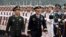 Joint Chiefs Chairman Gen. Martin Dempsey, right, and Chinese counterpart Gen. Fang Fenghui inspect a guard of honor during a welcoming ceremony at the Bayi Building in Beijing, China, April 22, 2013. 