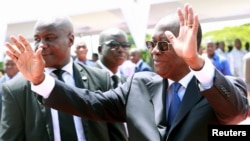 Le président ivoirien Alassane Ouattara arrive aux célébrations du 1er mai à Abidjan, le 1er mai 2017.