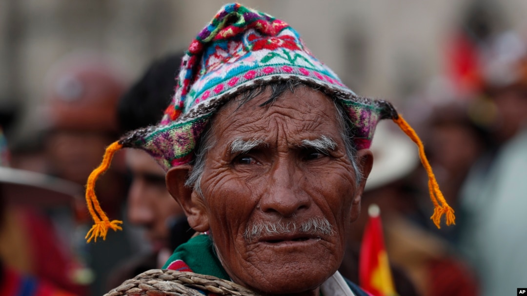 A Quechua indigenous supporter of Bolivian President Evo Morales attends a march in defense of his apparent reelection in La Paz, Bolivia, Nov. 5, 2019.