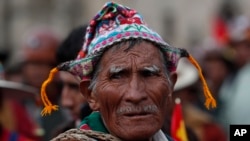 A Quechua indigenous supporter of Bolivian President Evo Morales attends a march in defense of his apparent reelection in La Paz, Bolivia, Nov. 5, 2019.