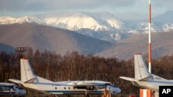 FILE - The Antonov An-26 with the same board number #RA-26085 as the missed plane is parked at Airport Elizovo outside Petropavlovsk-Kamchatsky, Russia, Nov. 17, 2020.