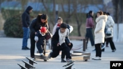 This photo taken on Jan. 16, 2025 shows a boy playing in a park in Fuyang, east China's Anhui province.